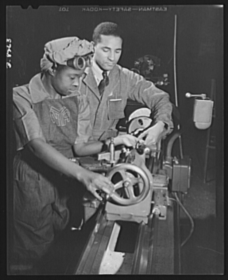 Juanita E. Gray at work at Washington Navy Yard, circa 1942. Black women and men in Northern Virginia found jobs in the District of Columbia, increasingly during World War II. At the time of the photo, more than 300 black women had been trained by the National Youth Administration War Production and Training Center. Library of Congress.