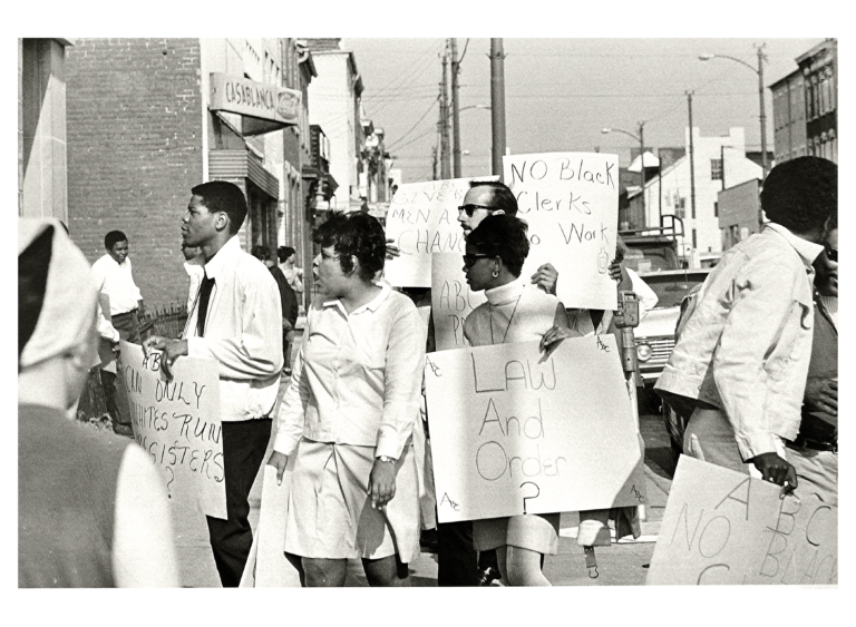 The Alexandria Urban League pickets a liquor store on May 15, 1969 to press the state liquor agency to hire more Black workers into front line positions. At the time, only three Black clerks were employed throughout the 40 Northern Virginia ABC stores. Reprinted with permission of the DC Public Library, Star Collection © Washington Post.