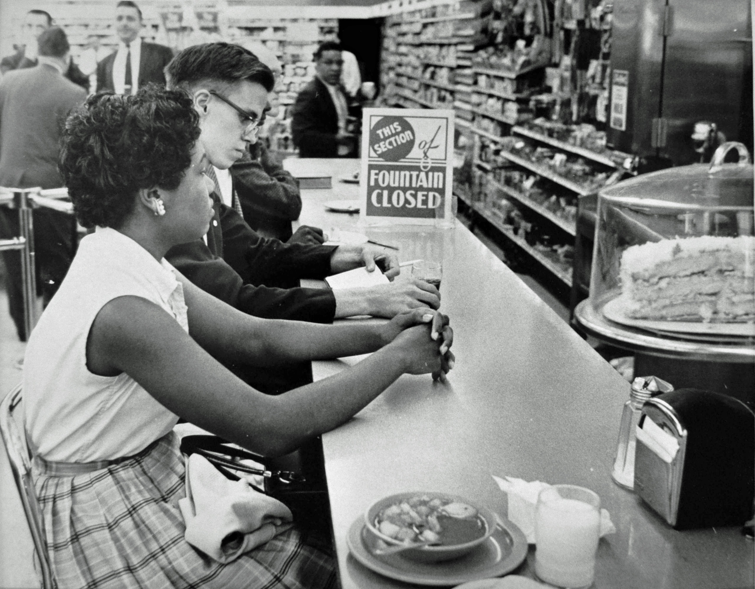Gwendolyn Greene (later Britt) sits at the People’s Drug Store counter during a sit-in protest in Arlington, June 9, 1960. DC Public Library, Star Collection © Washington Post.