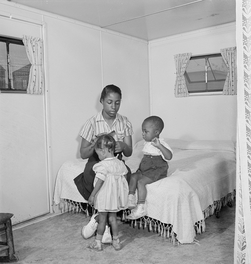Arlington, Virginia. FSA (Farm Security Administration) trailer camp project for Negroes. Interior of an expansible trailer, showing one wing used as a bedroom. Source: Library of Congress.