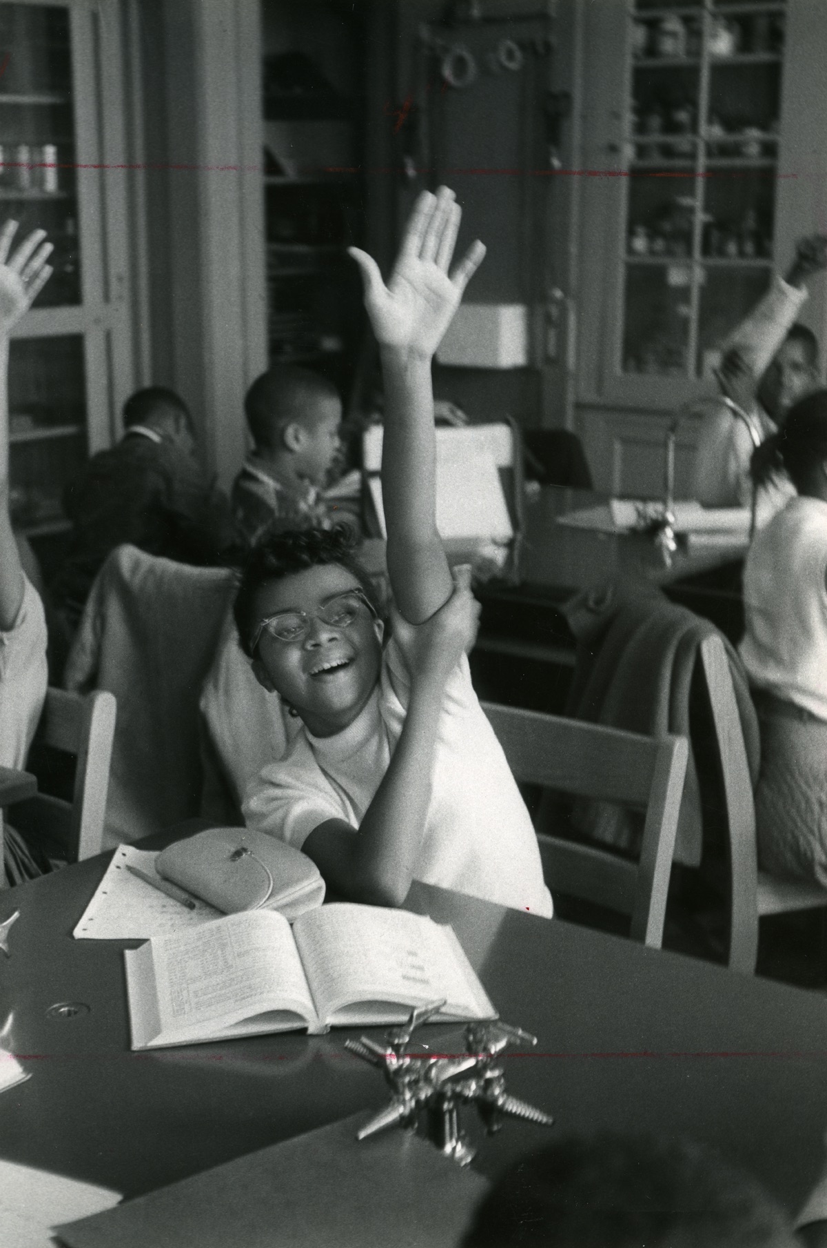 Female student raising her hand in a science classroom at Hoffman-Boston school, 1950s. Source: Center for Local History, Arlington Public Library.